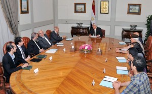 A handout picture released by the Egyptian Presidency shows Egypt's interim president Adly Mansour (C) meeting with opposition National Salvation Front leader Mohamed El Baradei (5thL) and heads of opposition Tamarod (Rebellion) group and other opposition leaders on July 6, 2013 in Cairo.  (AFP Photo)