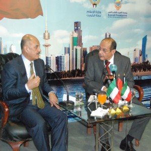 Badr Al-Humaidi in the left during his conference which held in Kuwait’s division in Cairo International Book Fair (Photo courtesy of Kuwait’s division)