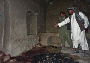 A villager points to a spot where a family was shot by US soldier Robert Bales in Afghanistan, March 11, 2012 (AFP/File, Mamoon Durrani) 