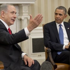 US President Barack Obama (R) listens to Israeli Prime Minister Benjamin Netanyahu during a meeting in the Oval Office of the White House in Washington, March 3, 2014  (AFP, Saul Loeb) 