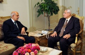 handout picture released by the Egyptian Presidency shows Egypt's interim president Adly Mansour (R) meeting with opposition National Salvation Front leader Mohamed ElBaradei in Cairo on July 6, 2013. Egypt's presidency said Saturday that ElBaradei has not been officially appointed prime minister, after several official sources said the former UN nuclear watchdog chief had been named premier. (Photo Egyptian Presidency/AFP)