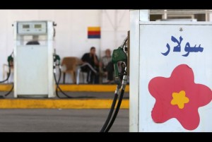 Palestinian men sit in a petrol station, which receives gas from neighbouring Egypt, in Gaza on June 29, 2013. (AFP Photo)