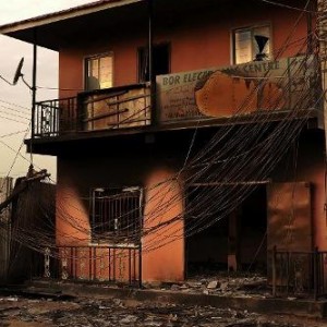 A business destroyed by looters in Bor on February 1, 2014. Some Bor residents have begun to return to their homes to salvage what's left of their belongings after fighting between opposition forces and government soldiers.  (AFP, Carl De Souza)