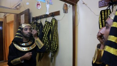 the groom wearing ancient Egyptian clothes