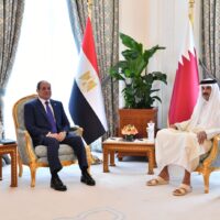 Egyptian President Abdel Fattah Al-Sisi with Qatari Emir Sheikh Tamim bin Hamad Al Thani in Doha on Monday