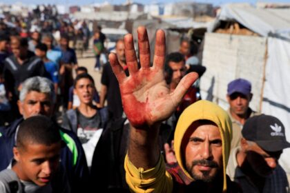 Dozens of Palestinians killed by Israeli fire near Gaza aid site
