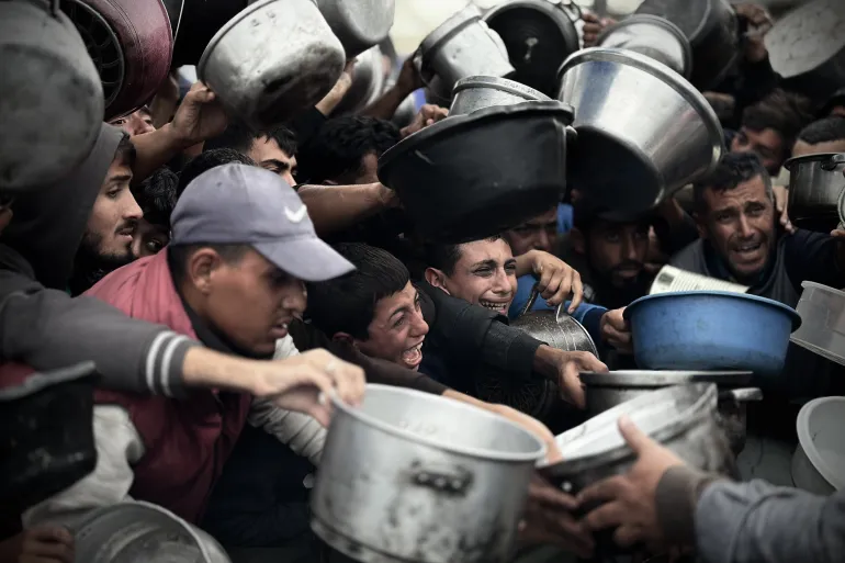 Egyptian aid convoy heads toward Gaza as humanitarian crisis deepens