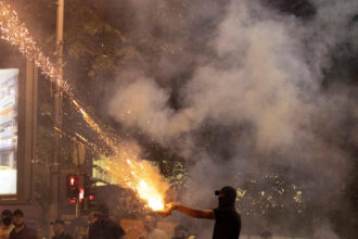 Serbia's Vucic vows 'tough measures' against protesters after unrest
