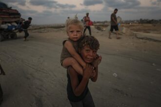 Egypt rescues Palestinian boy pictured carrying brother from Gaza bombing