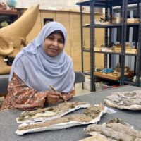 Lead author Sara Saber, Assistant Lecturer at Assiut University with the holotype specimen of Wadisuchus kassabi (MUVP 180)