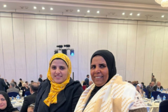 Nada Basyouny and Fadia saleh, beneficiaries of the water hyacinth handicrafts initiative, attend World Water Day 2026 in Cairo.