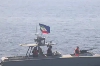 US drone strike destroys two Iranian boats attempting to seize naval vessel in Strait of Hormuz